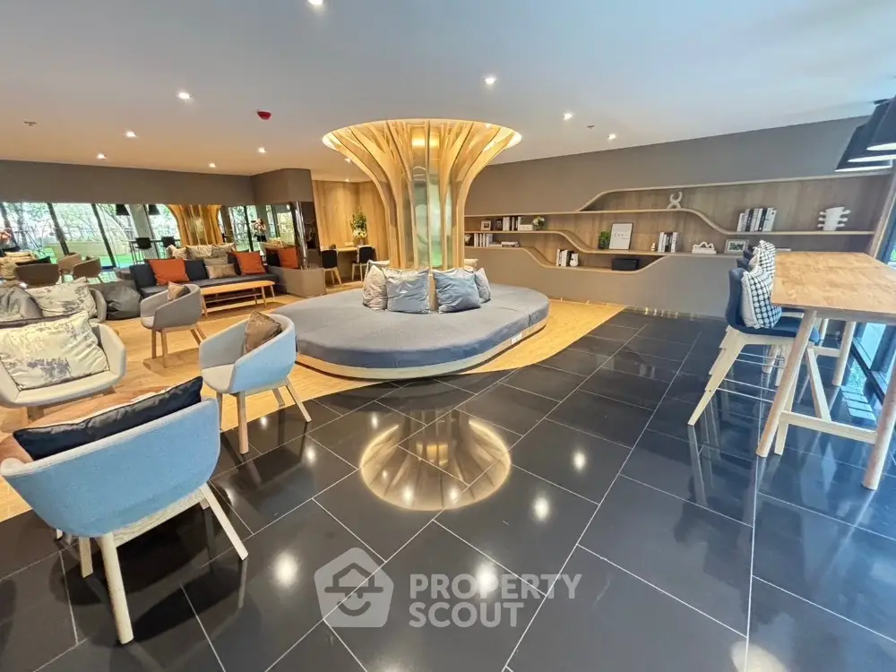 Luxurious modern living room with stylish furniture and unique central design feature