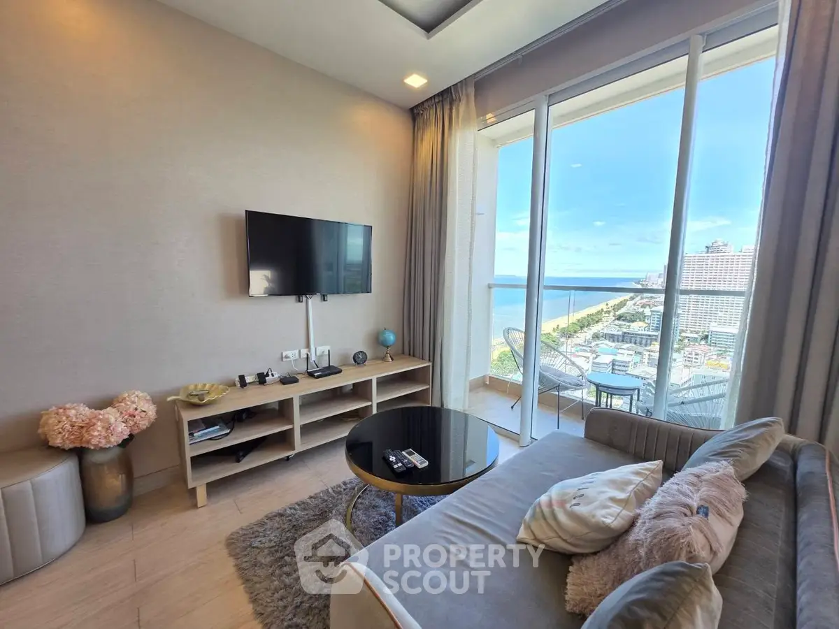 Modern living room with stunning ocean view and elegant decor