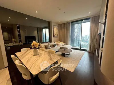 Luxurious living room with modern decor and stunning city view from large windows.