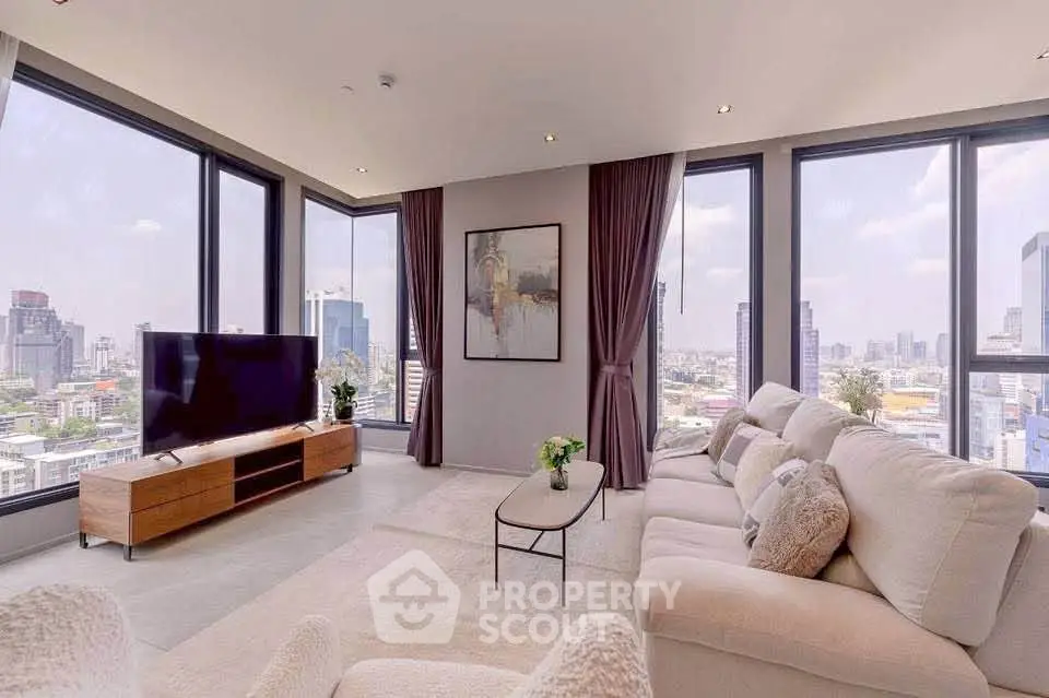 Luxurious corner living room with panoramic city views and modern decor