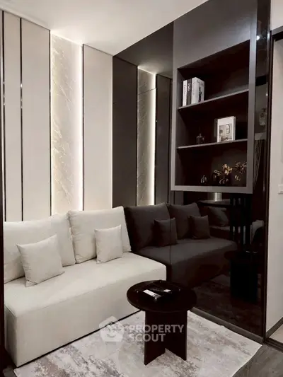 Modern living room with sleek design and cozy seating area