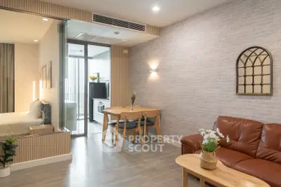 Modern living room with open layout, stylish decor, and cozy seating area in a contemporary apartment.