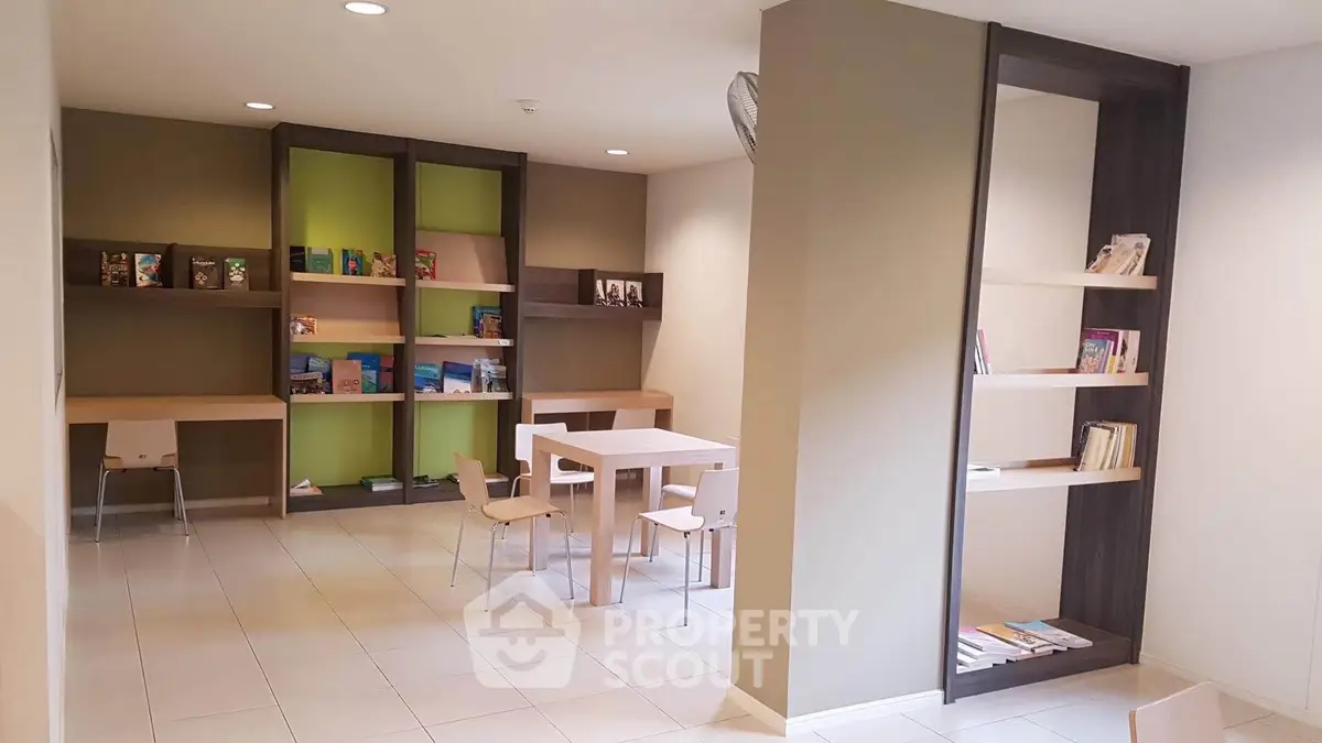 Modern library space with stylish shelving and seating area