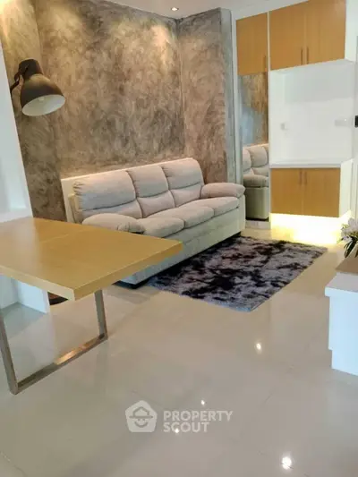 Modern living room with stylish sofa and sleek wooden accents