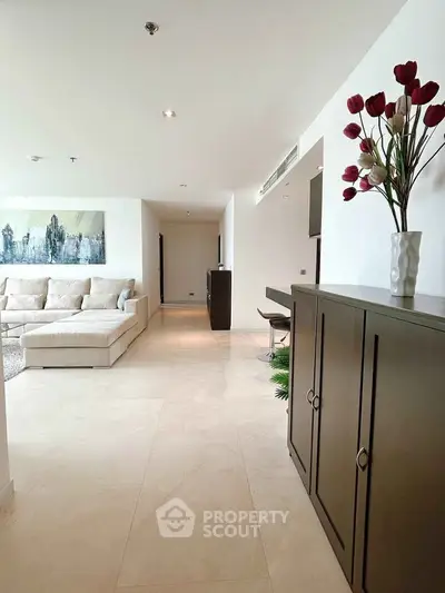Spacious modern living room with elegant decor and comfortable seating