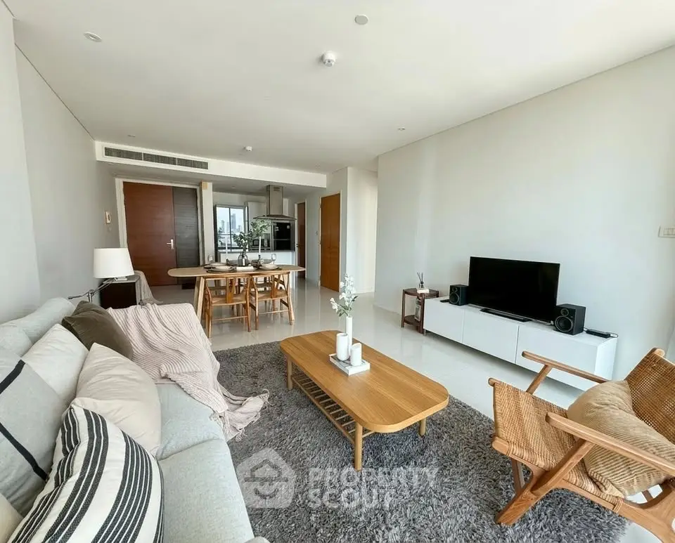 Spacious modern living room with stylish furniture and open layout