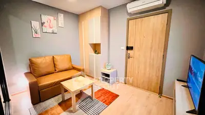 Cozy living room with modern decor and air conditioning