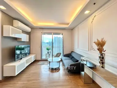 Modern living room with sleek design and city view balcony