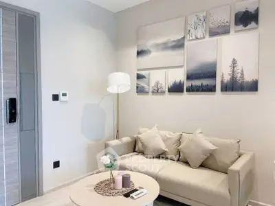 Modern living room with stylish decor and cozy beige sofa