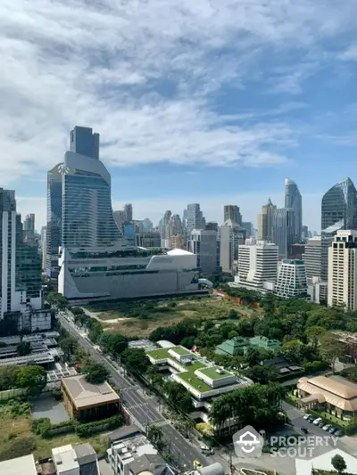 Stunning cityscape view with modern skyscrapers and lush greenery, perfect for urban living enthusiasts.