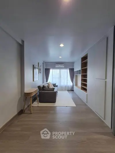 Spacious modern living room with stylish furniture and ample natural light