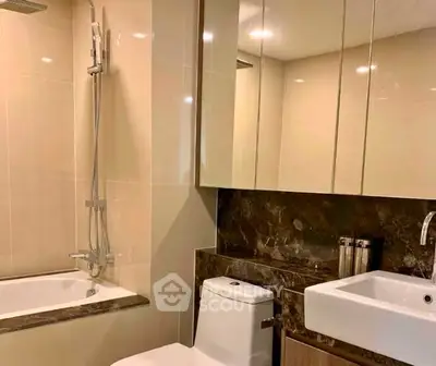 Modern bathroom with sleek fixtures and elegant marble accents