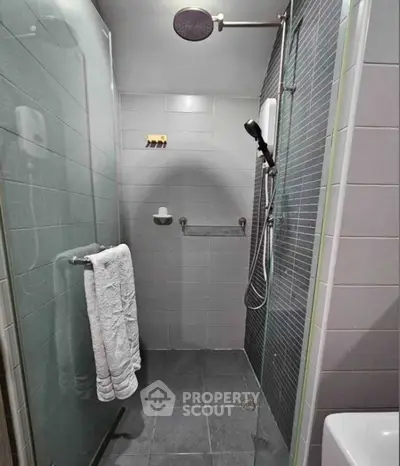 Modern bathroom with sleek shower design and contemporary fixtures