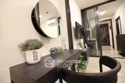 Modern living room with stylish decor and sleek furniture in a contemporary apartment.