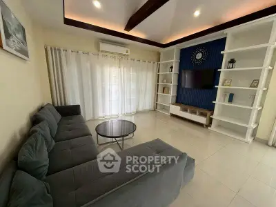 Spacious modern living room with elegant decor and large sectional sofa