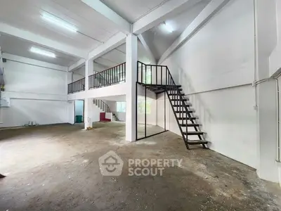 Spacious industrial-style loft with high ceilings and mezzanine level
