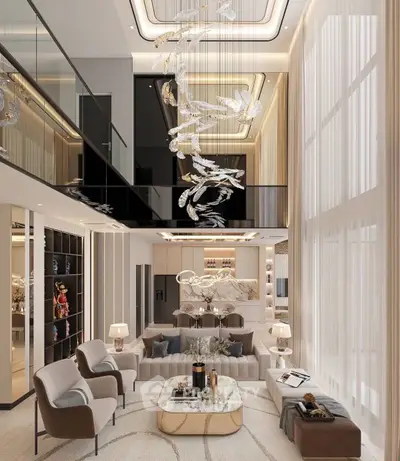 Luxurious modern living room with high ceilings and elegant chandelier