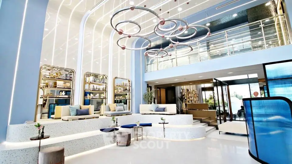 Luxurious modern living room with high ceilings and elegant lighting fixtures