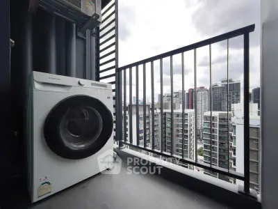 Modern balcony with washing machine and cityscape view
