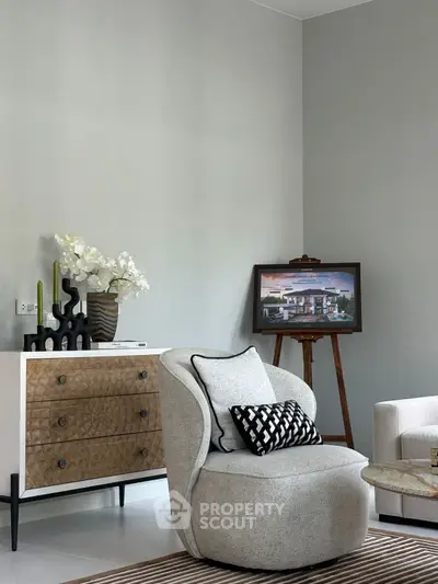 Stylish modern living room with elegant furniture and decor, perfect for contemporary living.