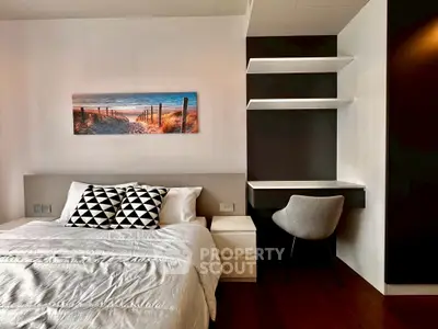 Modern bedroom with stylish decor and cozy workspace