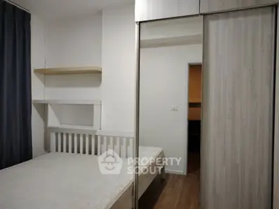 Cozy bedroom with modern wardrobe and minimalist decor