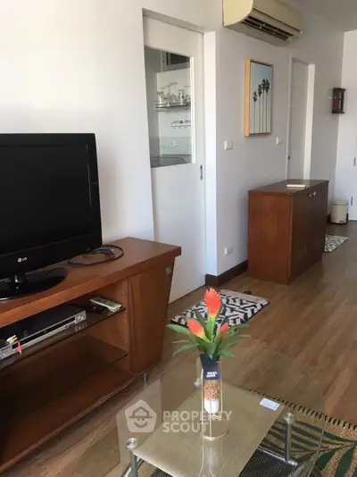 Cozy living room with wooden furniture and modern decor