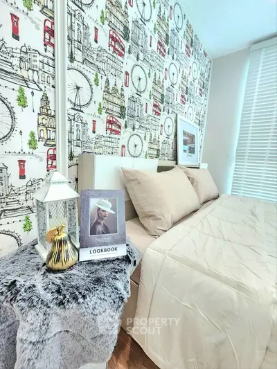 Chic bedroom with London-themed wallpaper and cozy decor, perfect for urban living.