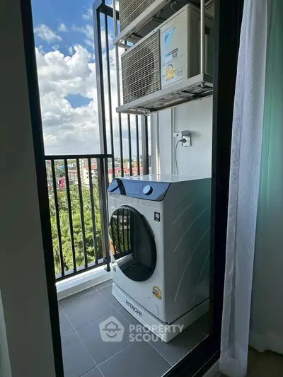 Modern balcony with washing machine and air conditioning units, offering a scenic city view.
