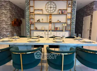 Luxurious dining room with elegant decor and modern furniture, perfect for entertaining guests.