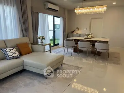 Luxurious modern living room with elegant dining area and stylish decor