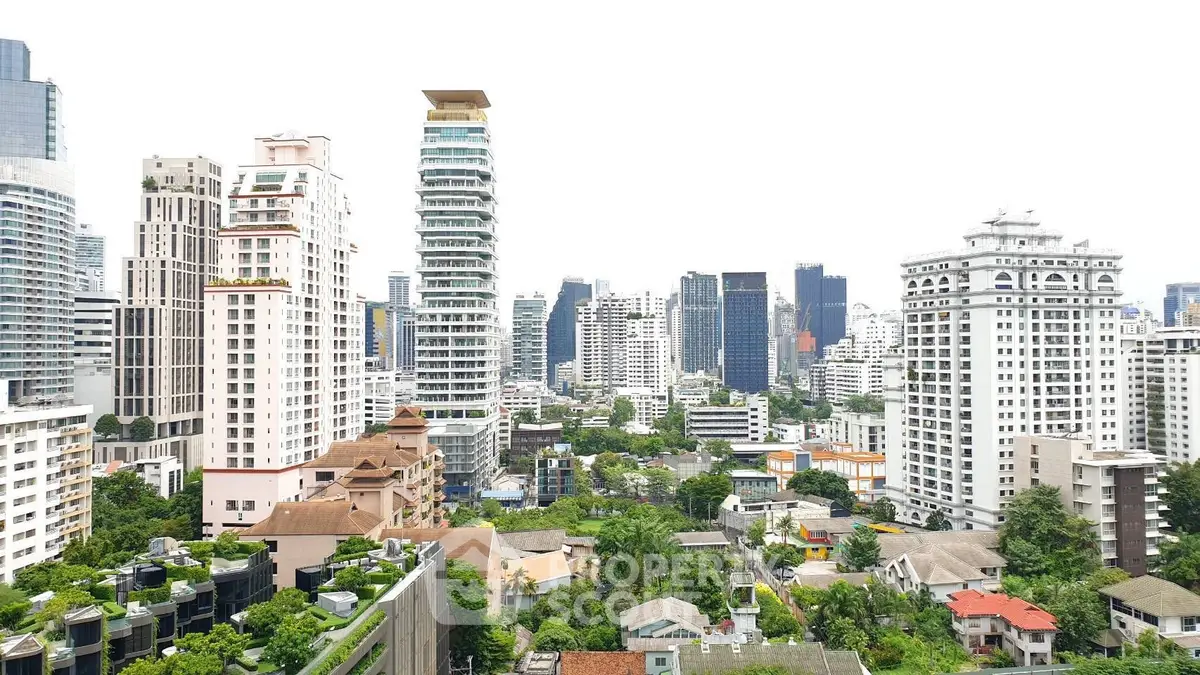 Stunning cityscape view showcasing modern high-rise buildings and lush greenery.