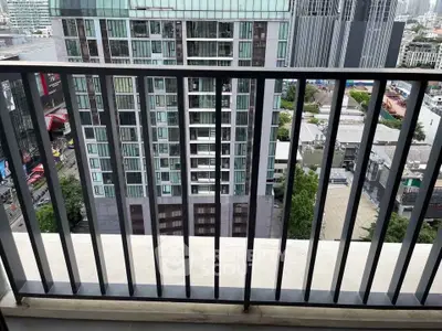 Stunning cityscape view from a modern high-rise balcony, perfect for urban living enthusiasts.