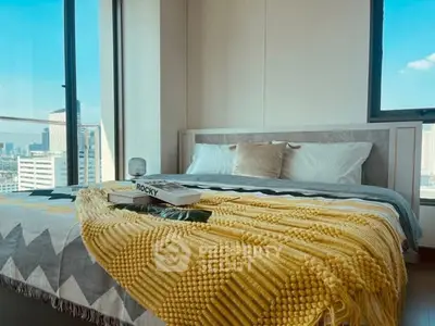 Modern bedroom with city view and stylish decor