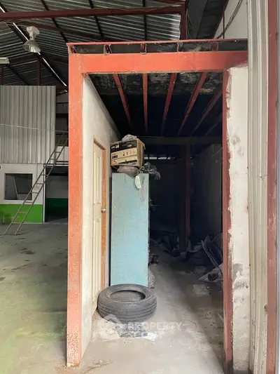 Industrial warehouse interior with mezzanine and storage potential