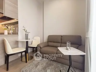 Cozy modern living room with plush sofa and elegant decor