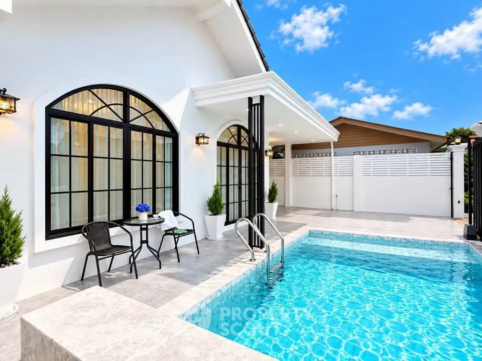 Luxurious villa with private pool and elegant patio, perfect for relaxation and entertaining.