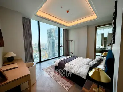 Luxurious bedroom with floor-to-ceiling windows offering stunning city views, modern decor, and elegant lighting.