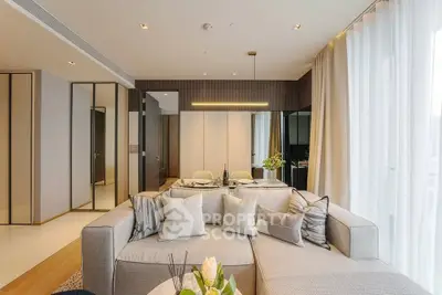 Luxurious modern living room with elegant decor and ample natural light