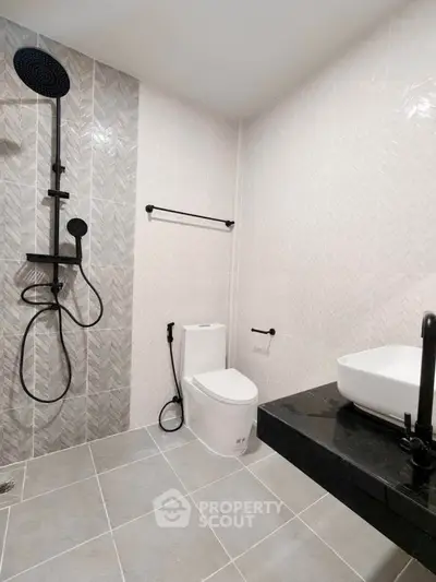 Modern bathroom with sleek fixtures and stylish tile design