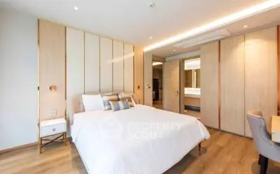 Luxurious modern bedroom with ensuite bathroom and elegant decor