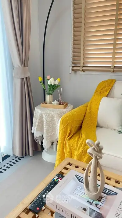 Cozy living room with stylish decor and natural light