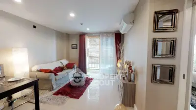 Stylish living room with modern decor and balcony view