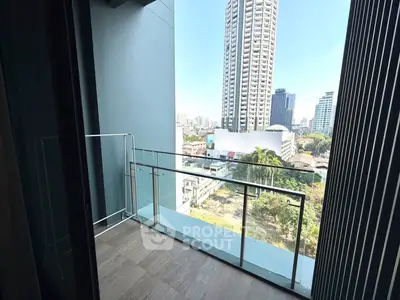 Modern balcony with city view in high-rise apartment