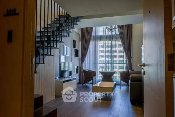 Luxurious duplex living room with high ceilings and modern decor