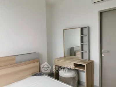 Modern bedroom with minimalist wooden furniture and air conditioning