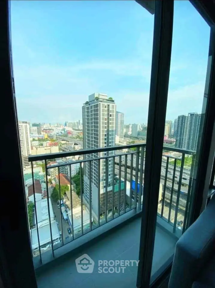 Stunning cityscape view from a high-rise balcony, perfect for urban living enthusiasts.