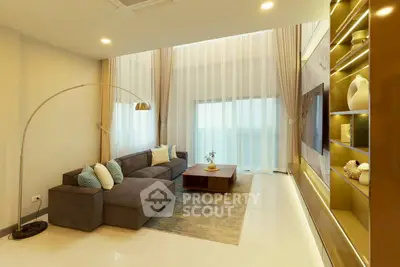 Luxurious modern living room with high ceilings and elegant decor