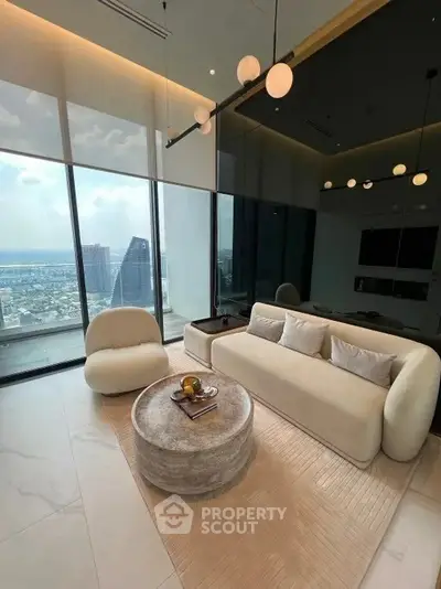Luxurious modern living room with panoramic city view and elegant furnishings.