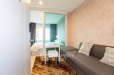 Modern apartment interior with cozy living room and bedroom view